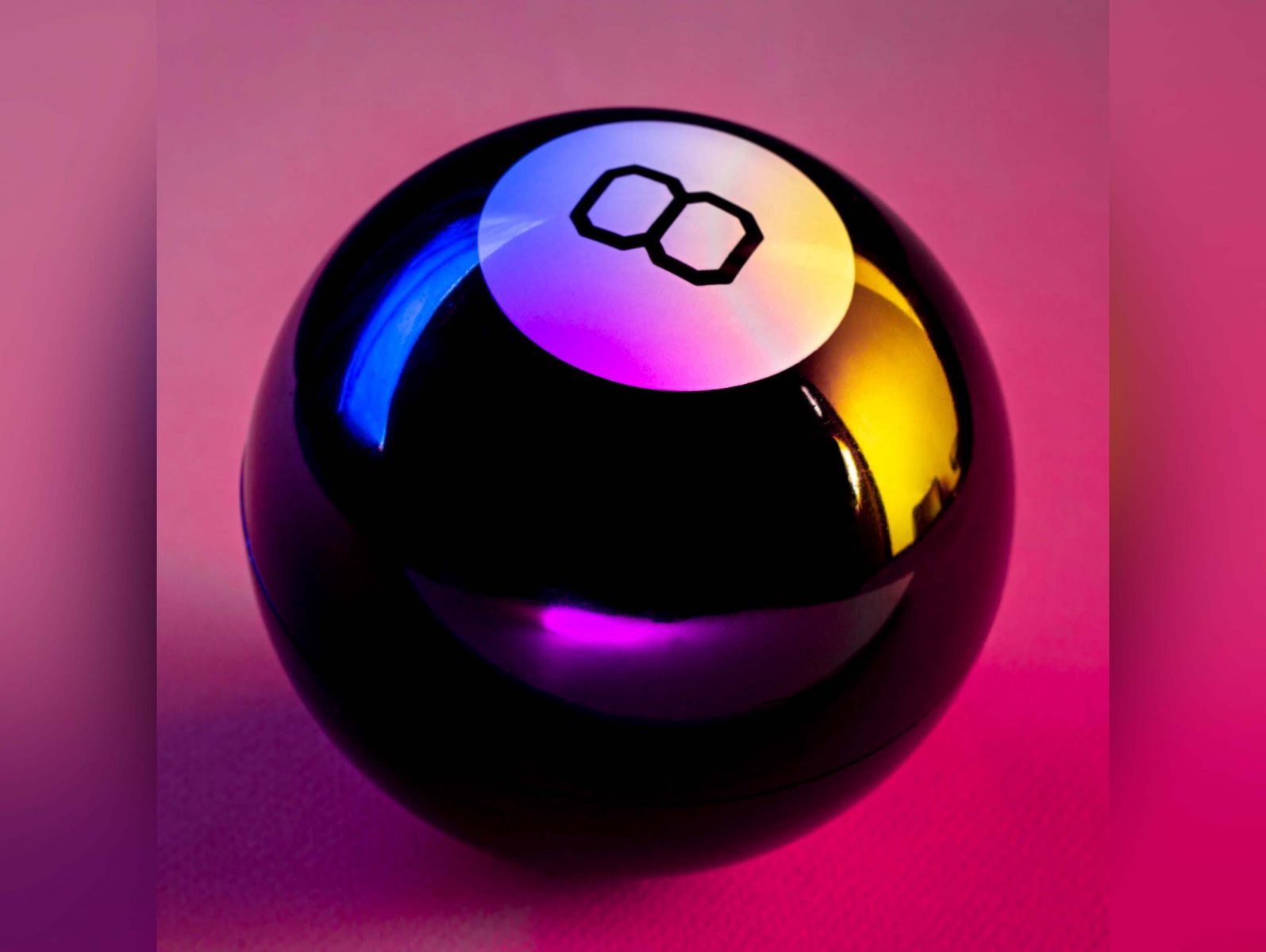 Magic 8 ball lit by pink, yellow, and blue neon lights