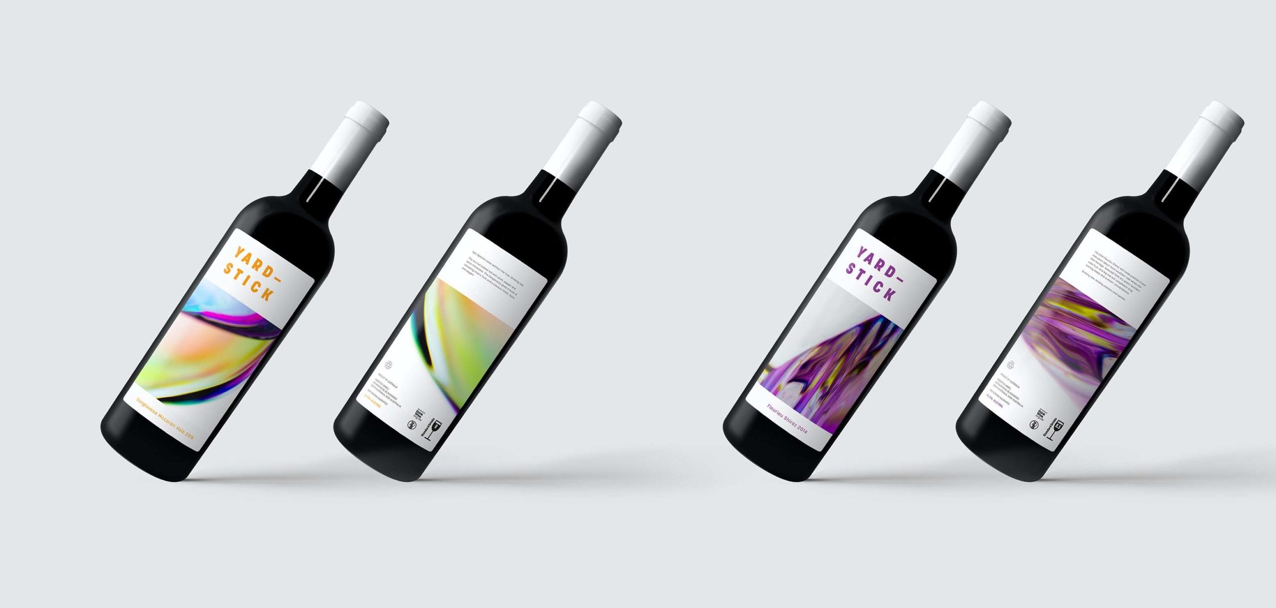 Front and back of wine bottles against a white background