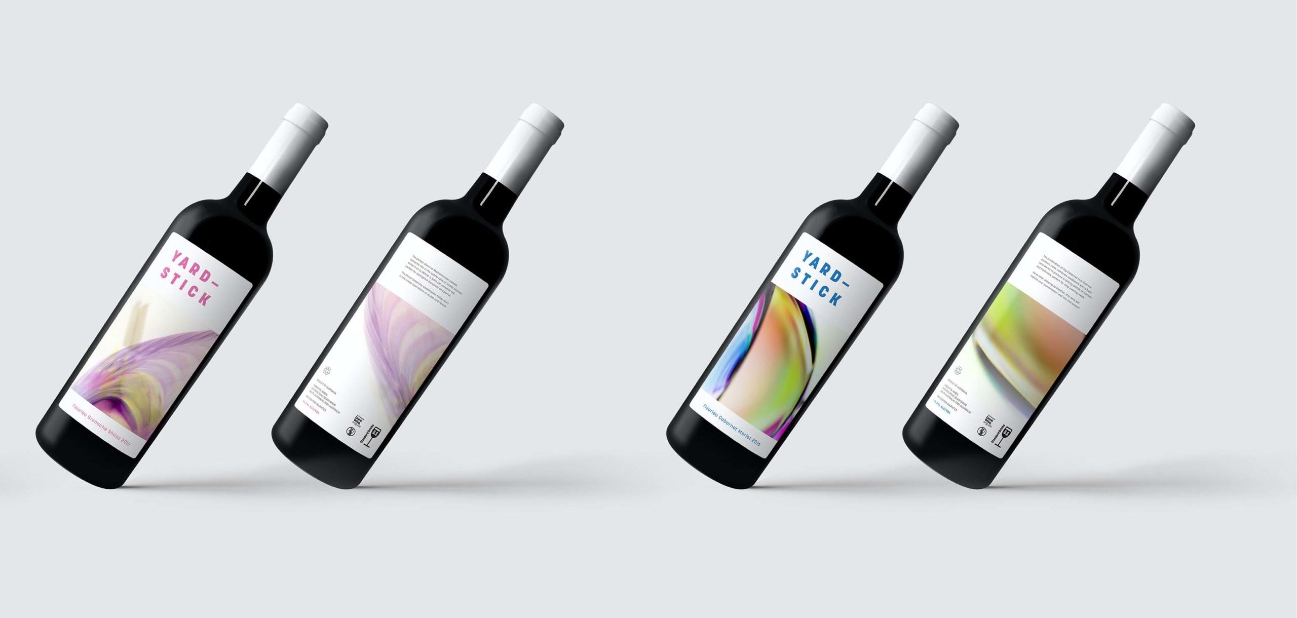 Front and back of wine bottles against a white background